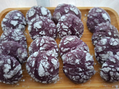Ube crinkle cookies arranged together in a serving tray
