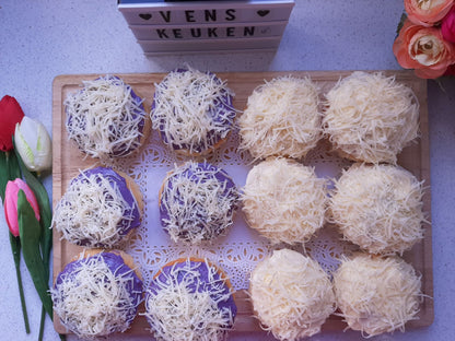Twelve special ensaymada arranged in four flavours and topped with grated cheese