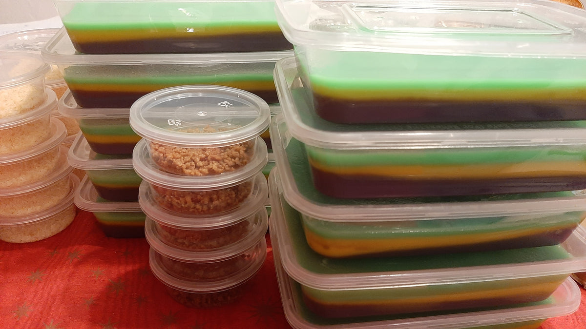 Close-up of colourful sapin-sapin overload tubs stacked for collection