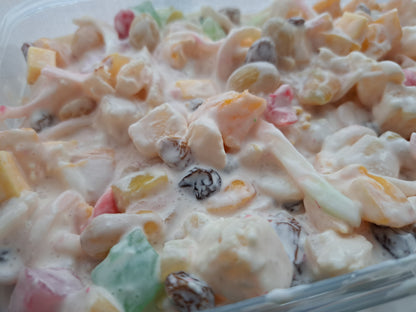 Close-up of Filipino fruit salad with raisins and coconut strips