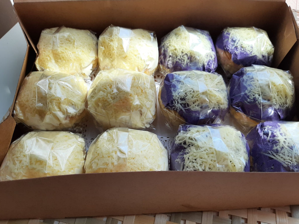 Box of individually wrapped special ensaymada in classic and ube flavours
