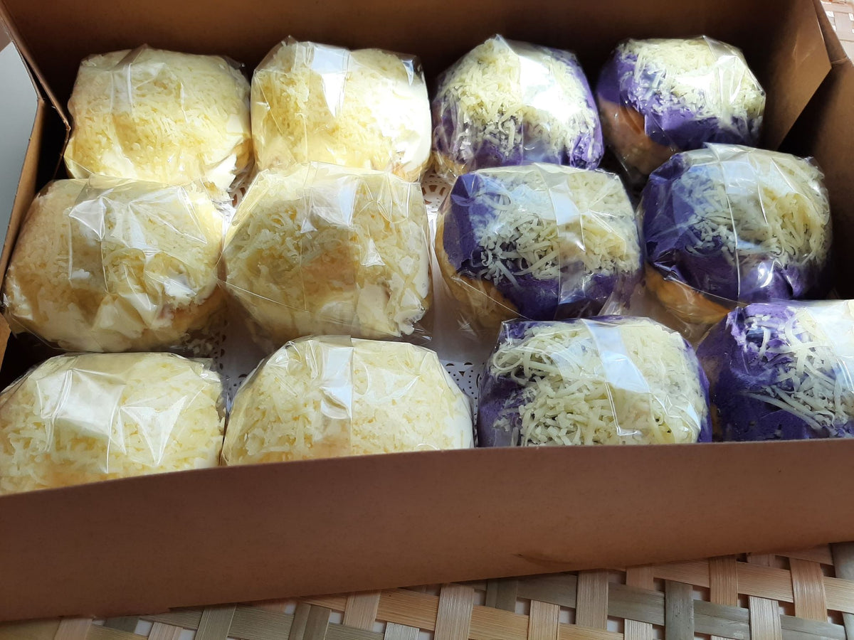 Open box of twelve individually wrapped special ensaymada