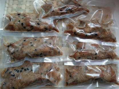 Rows of vacuum-packed pork humba 200 g portions