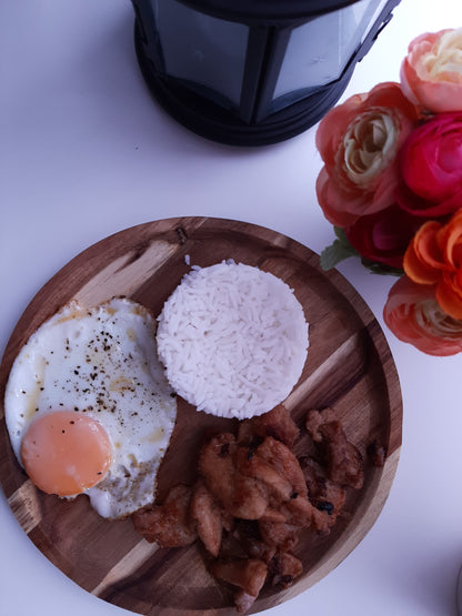 Filipino chicken tocino meal with fried egg and a mound of rice