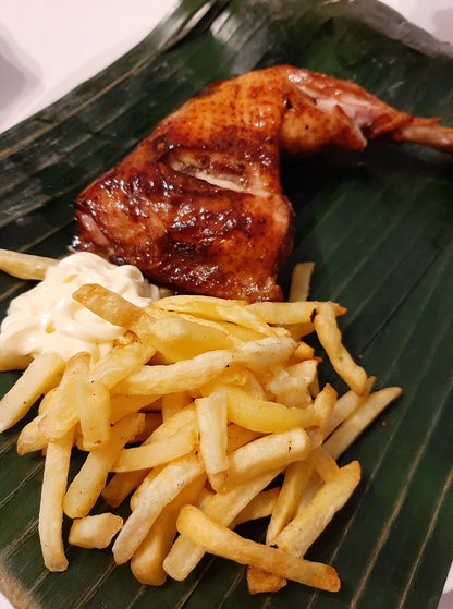 Baked chicken inasal thigh served with crisp golden fries