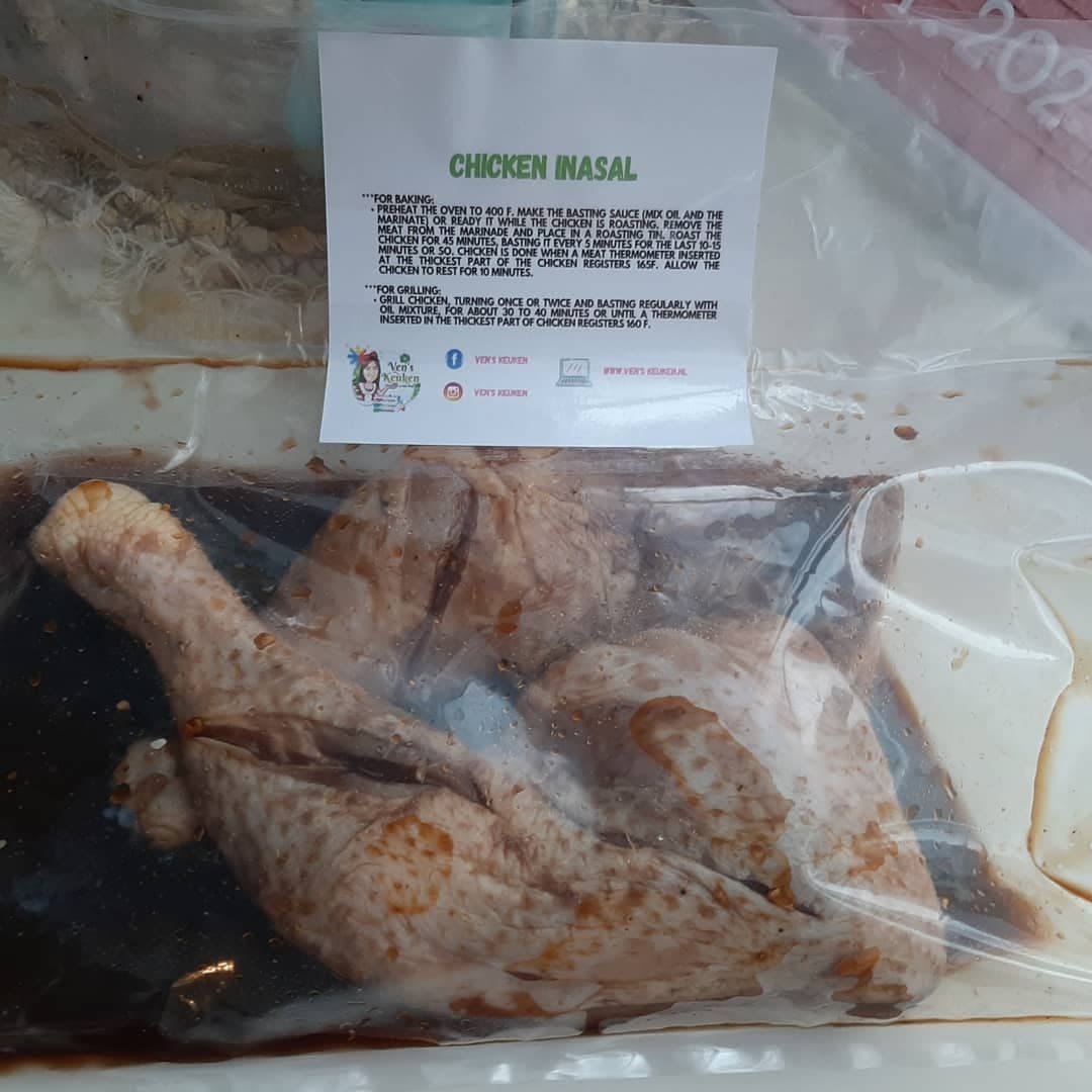 Vacuum-packed marinated chicken inasal thighs with product label