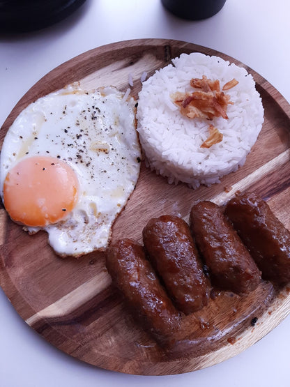 Chicken longganisa breakfast plate with fried egg and steamed rice