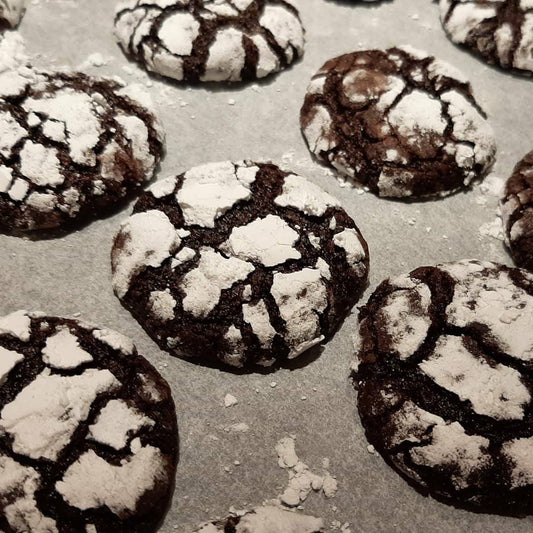 Chocolate crinkle cookies with bold powdered-sugar cracks