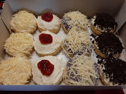 Assorted special ensaymada with cheese, strawberry, ube and oreo toppings