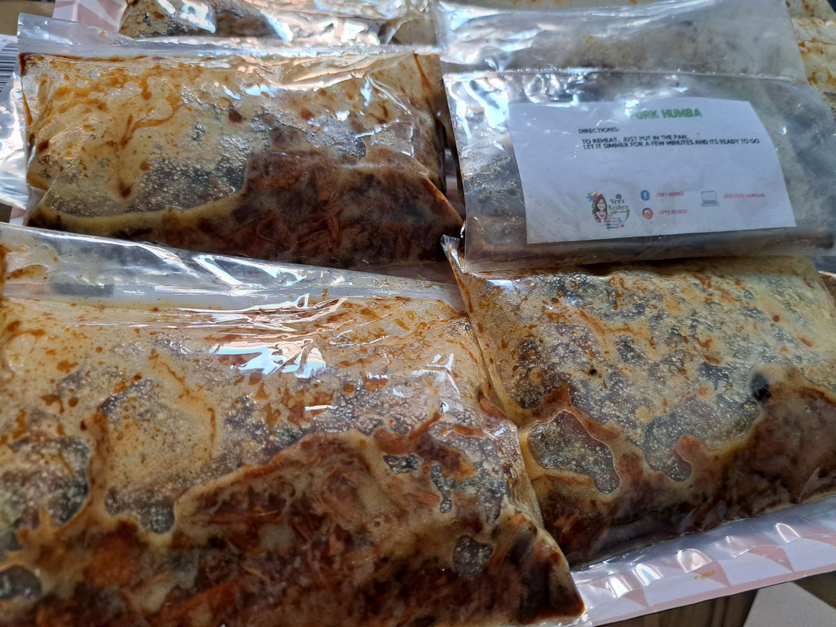 Several vacuum-packed 200 g pork humba portions ready for storage