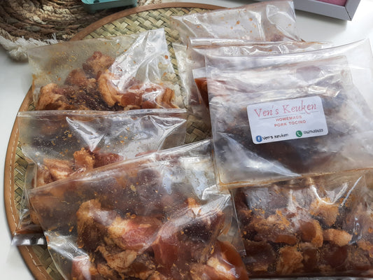 Frozen pork tocino portions in sealed packs with Ven's Keuken label