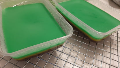 Two sapin-sapin overload tubs showing the smooth green top layer